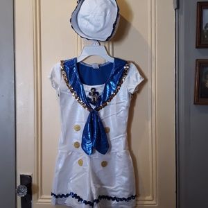 Size 12-14 will fit smaller. 1piece sailor outfit.